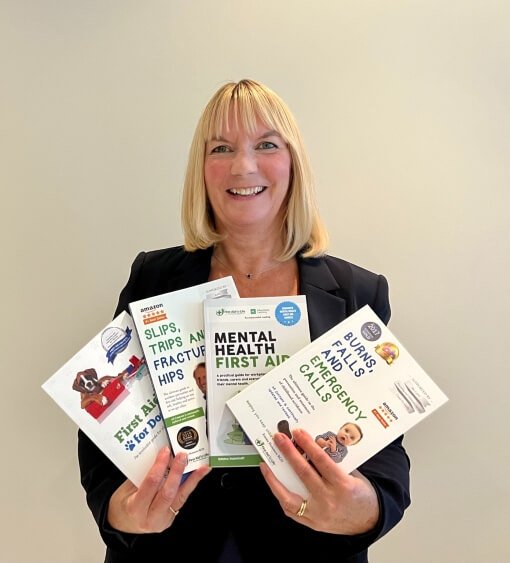 emma-with-books-about Emma Hammett with first aid books