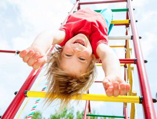 happy child on jungle gym
